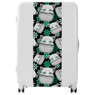 Cat Cute and Playful peaking from a Pocket Luggage