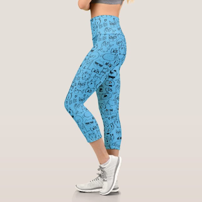 Cat Doodles, Funny Kitty Pattern on Blue Capri Leggings (Left)