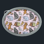 Cat Drawing Cute Vintage Pattern Oval Belt Buckle<br><div class="desc">This cute cat pattern belt buckle shows eight different cats and kittens in various poses, all colored in shades of orange, grey, blue, brown and cream. Two cats sit in front of a bowl. One lounges. One sits and stares. One licks its paw. And the other three are playing. All...</div>