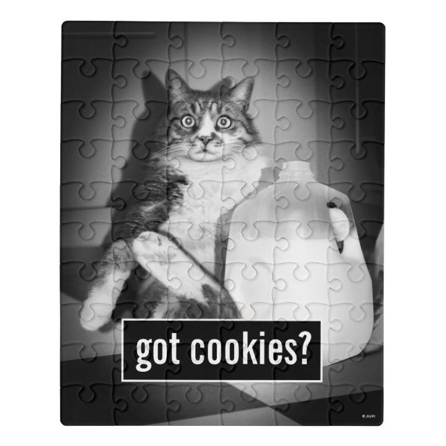 Cat Drinking Milk From Jug Jigsaw Puzzle (Puzzle Vertical)