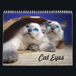 Cat Eyes Calendar<br><div class="desc">A beautiful gift of color photography of cats and kittens close ups for the special cat lover for New Years. The brightly colored eyes will keep one waiting for the next month to arrive. When the year is over, frame the magnificent portraits and display on a favorite wall.</div>