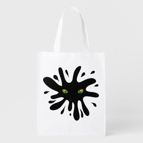 Cat Eyes looking out a Black Blob   Grocery Bag