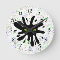 Cat Eyes looking out a Black Blob