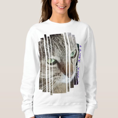 Cat gazes lovingly at its owner sweatshirt