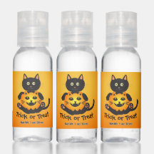 Cat Holding Jack-o'-Lantern