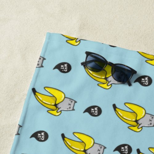 Cat in banana beach towel