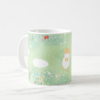 cat in the grass coffee mug