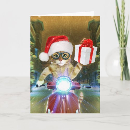 Cat in the Santa Claus hat delivers Christmas gift Card