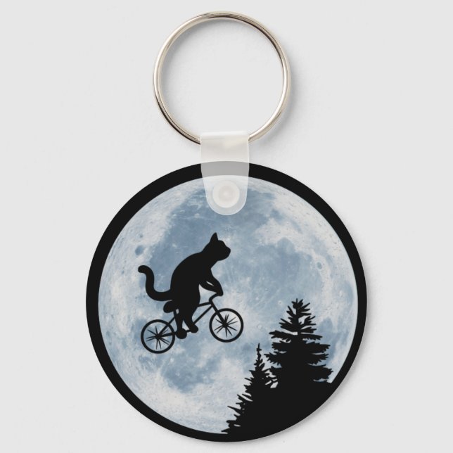 Cat is riding bicycle on the moon background. keychain (Front)