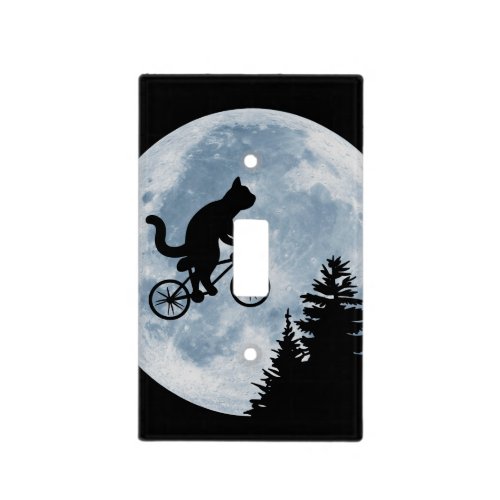 Cat is riding bicycle on the moon background light switch cover