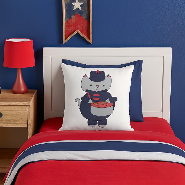Cat Marching Band Drummer Navy Blue Red Throw Pillow (A throw pillow featuring a gray cat playing the drums in a navy blue & red marching band uniform.)