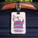 Cat on a Stack of Books Cute Personalized Literary Luggage Tag<br><div class="desc">This adorable, personalized luggage tag is perfect for anyone who enjoys a good book and a sleeping kitty cat. (There's nothing better). The design is made in bright shades of pink, blue, and orange with a calico kitty perched on top of the book stack, snoozing. The text currently says, "Happiness...</div>