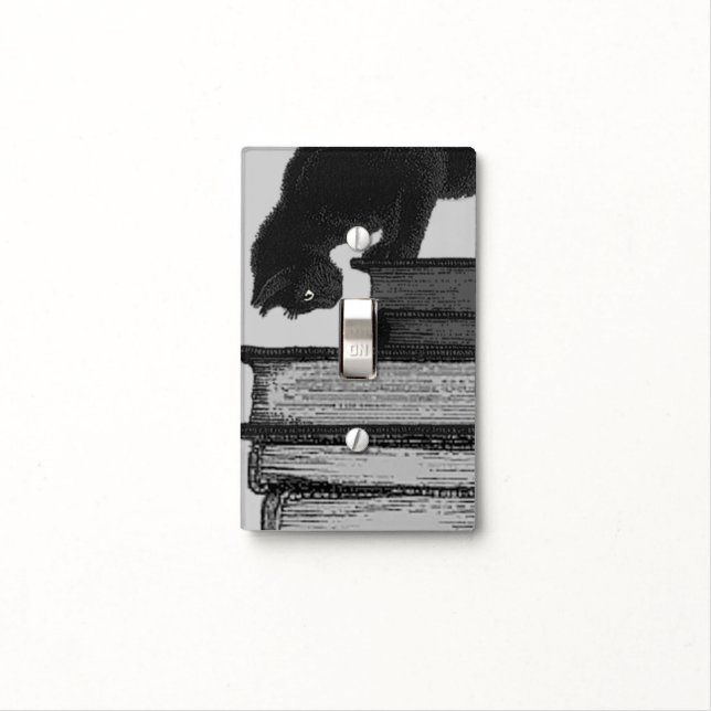 Cat on books - Lightswitch Cover (In Situ)