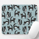 Cat Pattern Blue Mouse Pad<br><div class="desc">Cute black and white tuxedo cats going about their business. A fun pattern on a mid teal background,  perfect for animal and pet lovers. Cats love a mouse.  Original art by Nic Squirrell.</div>