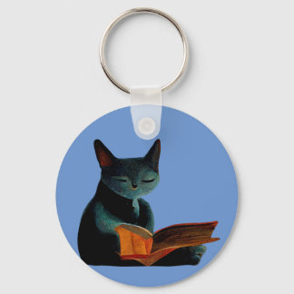 Cat reading a book keychain