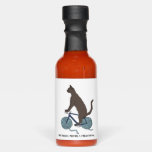 cat riding bike with yarn ball wheels hot sauces