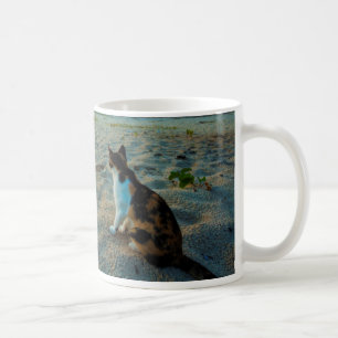 Cat Sitting On A Beach Coffee Mug
