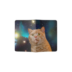 Cat watching the space passport holder