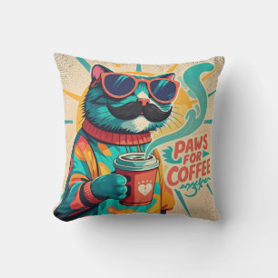 Cat wearing oversized sunglasses, holding a coffee throw pillow