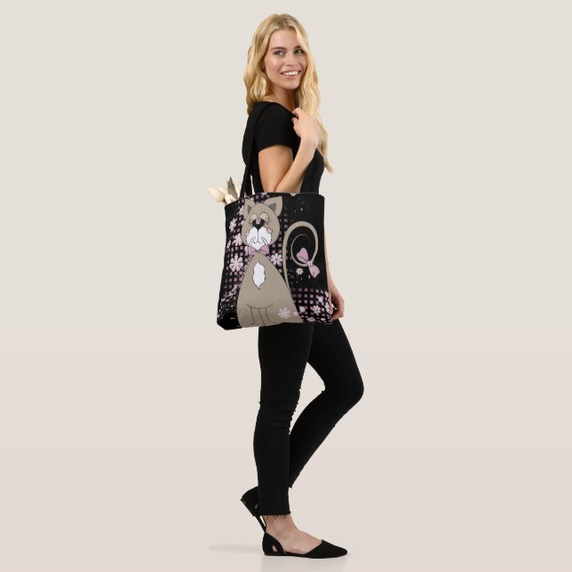 cat with bow tie on black tote bag (On Model)