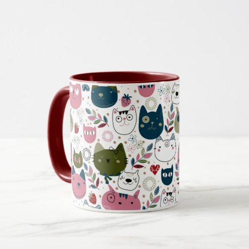 Cats faces muted warm green teal pink pattern mug