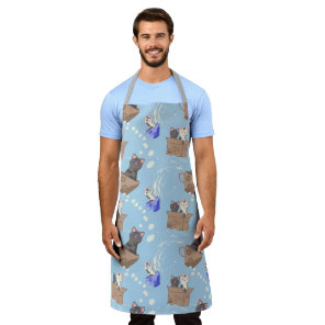 Cats in box and milk drops on blue apron