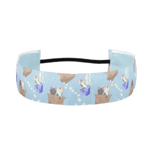 Cats in box and milk drops on blue athletic headband