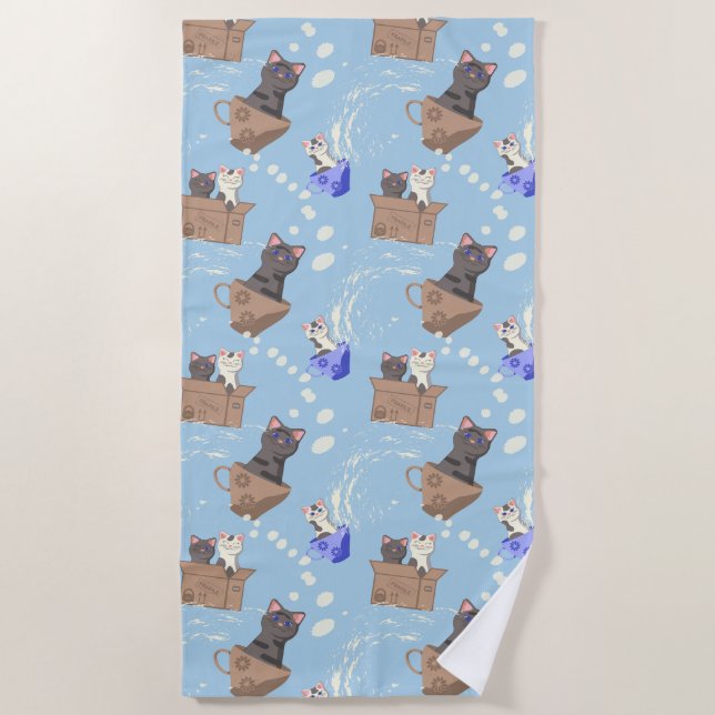 Cats in box and milk drops on blue beach towel (Front)