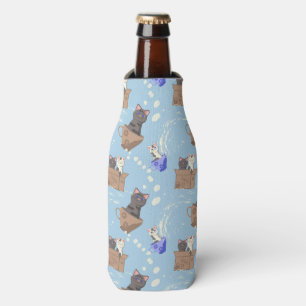 Cats in box and milk drops on blue bottle cooler