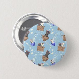 Cats in box and milk drops on blue button