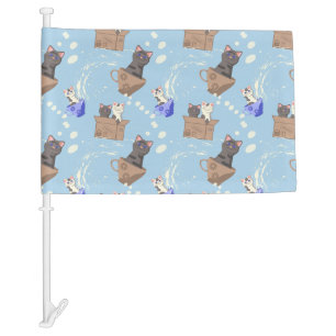 Cats in box and milk drops on blue car flag