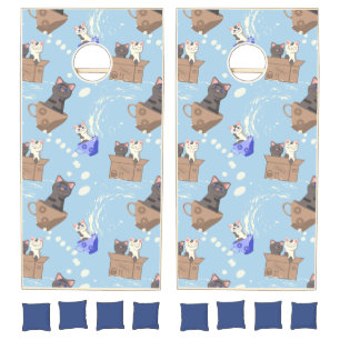 Cats in box and milk drops on blue cornhole set