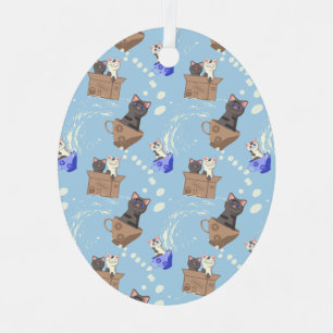 Cats in box and milk drops on blue metal ornament