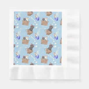 Cats in box and milk drops on blue napkins