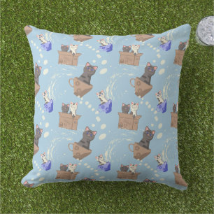 Cats in box and milk drops on blue outdoor pillow