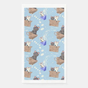 Cats in box and milk drops on blue paper guest towels