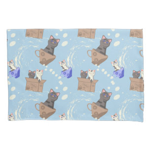 Cats in box and milk drops on blue pillow case
