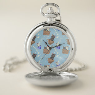 Cats in box and milk drops on blue pocket watch