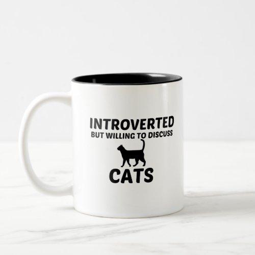 CATS INTROVERTED BUT WILLING TO DISCUSS Two_Tone COFFEE MUG