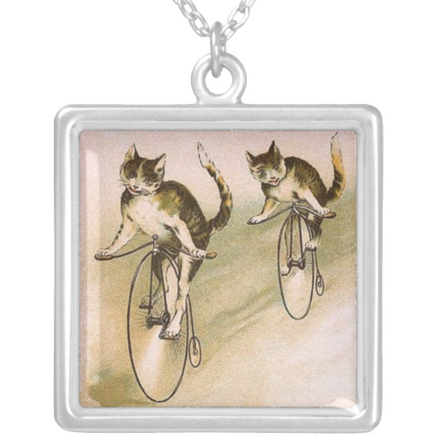 Cats on bikes silver plated necklace (Front)
