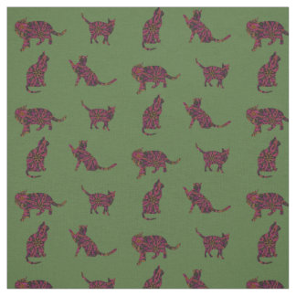 Cats on green fabric