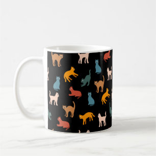 Cats on the black coffee mug