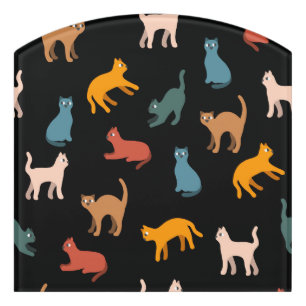 Cats on the black door sign