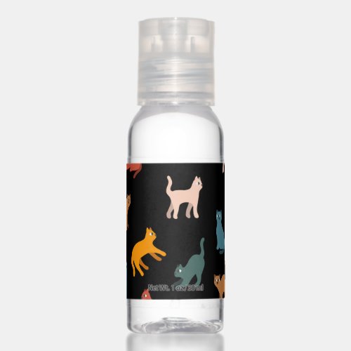 Cats on the black hand sanitizer