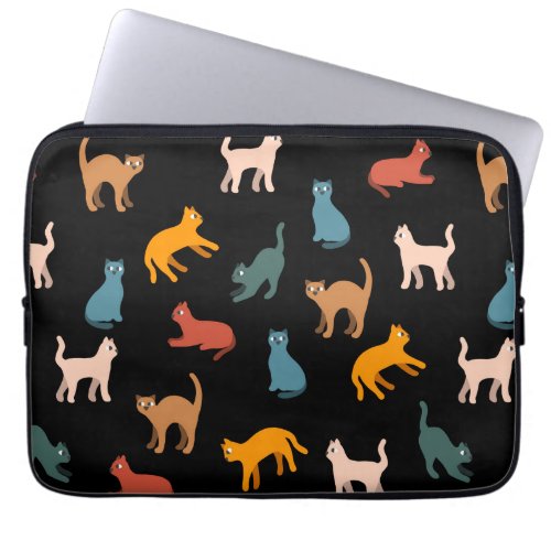 Cats on the black laptop sleeve