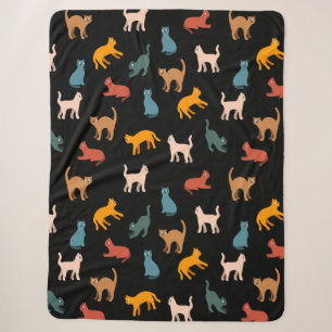 Cats on the black sherpa blanket