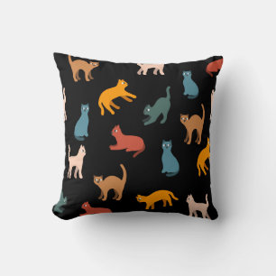 Cats on the black throw pillow