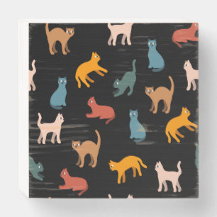 Cats on the black wooden box sign