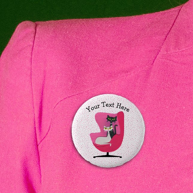 Cats Pretty Eyes Mid Century Pink Chair Dots Button (Two cats pretty green yellow eyes in mid century pink chair with pink dots on white pin back button.)