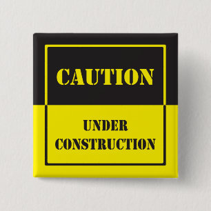 caution sign under construction pinback button